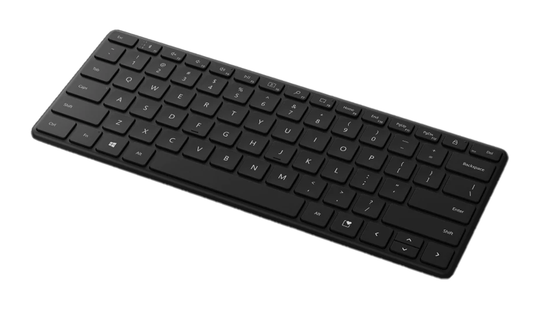 The Microsoft Designer Compact Keyboard in Matte Black from a side view