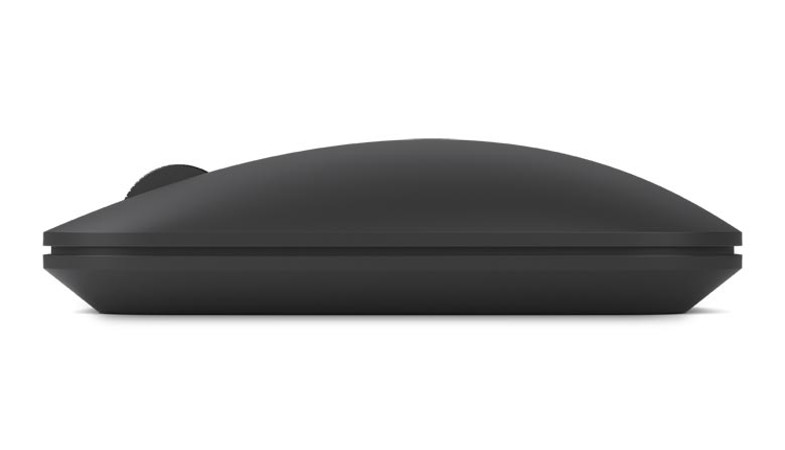 La souris Designer Bluetooth en noir d'une perspective latérale
