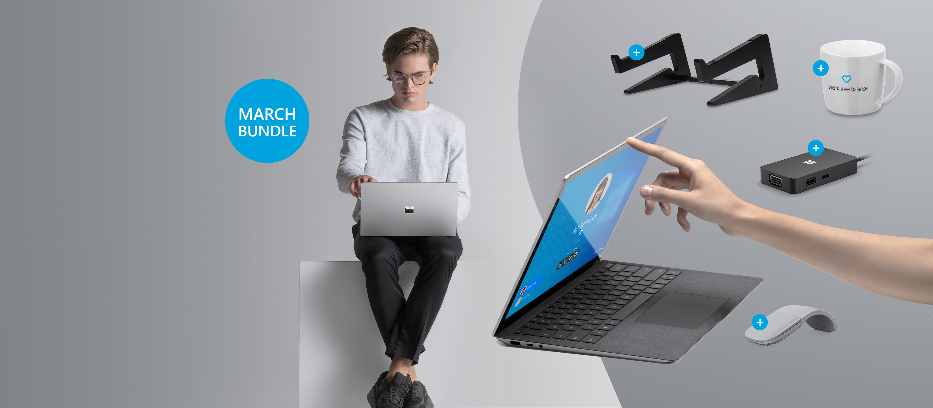 The Surface Laptop 4 is placed in front of a young man who is using the Surface Laptop 4.