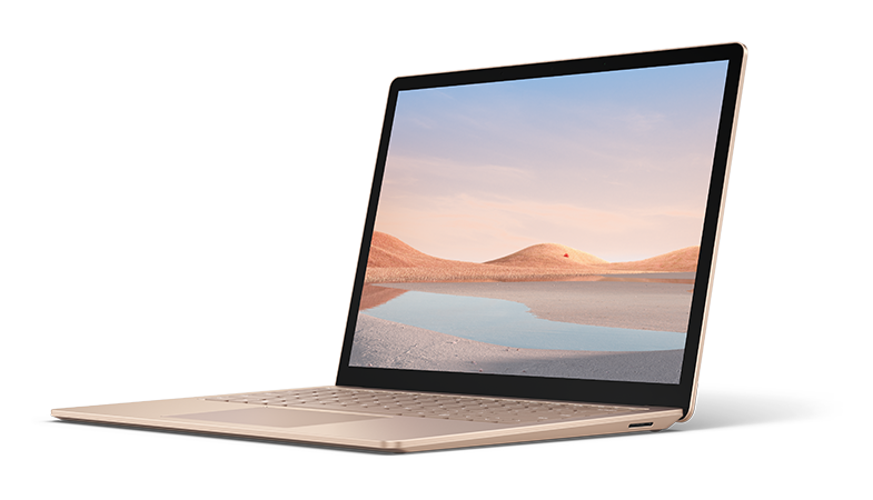 The Surface Laptop 4 flipped open in Sandstone from a lateral perspective with a blue heart that says NEW on the left next to the Surface device 