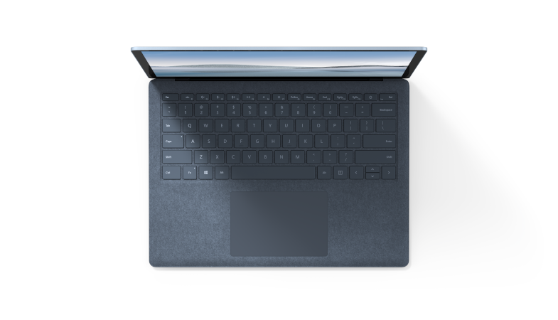 The Surface Laptop 4 in Ice Blue is shown opened from the bird's eye view