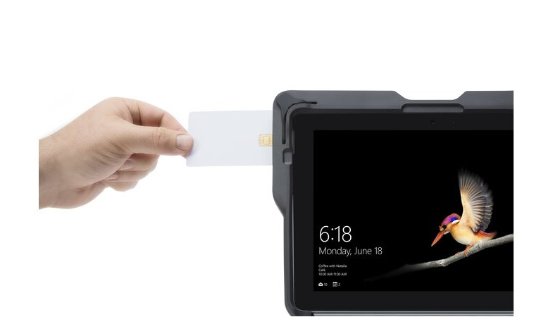 A card is inserted into the card reader of the BlackBelt for Surface Go with CAC card reader 