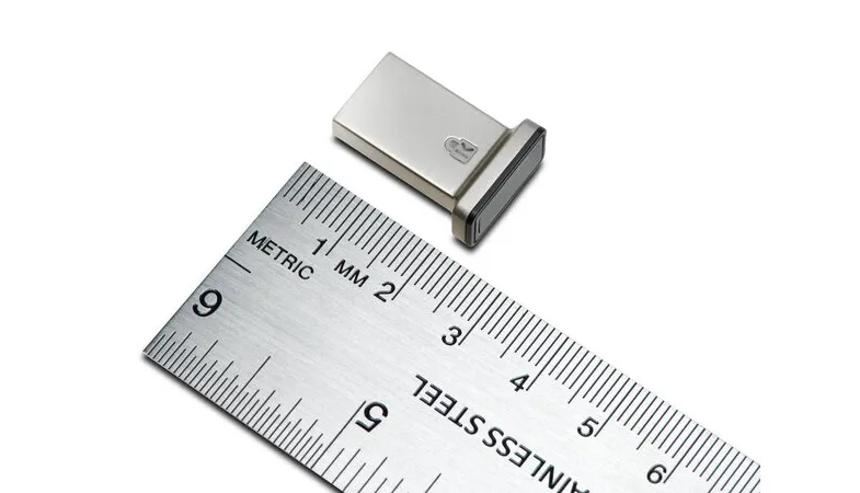 Kensington VeriMark™ IT Fingerprint Key from above with ruler to estimate the size of the Fingerprint Key