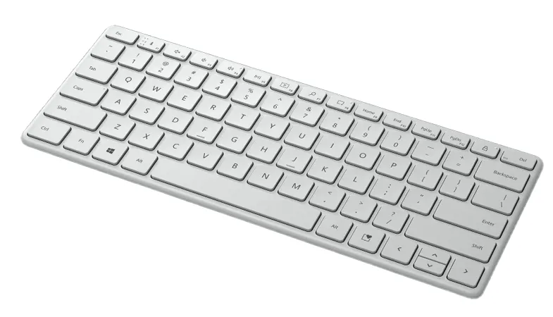 The Microsoft Designer Compact Keyboard in Glacier from a side view