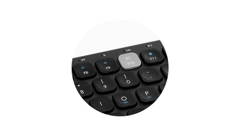 Scissor keys with multimedia hotkeys and low battery indicator  Detail of the Multi-Device Dual Wireless Compact Keyboard