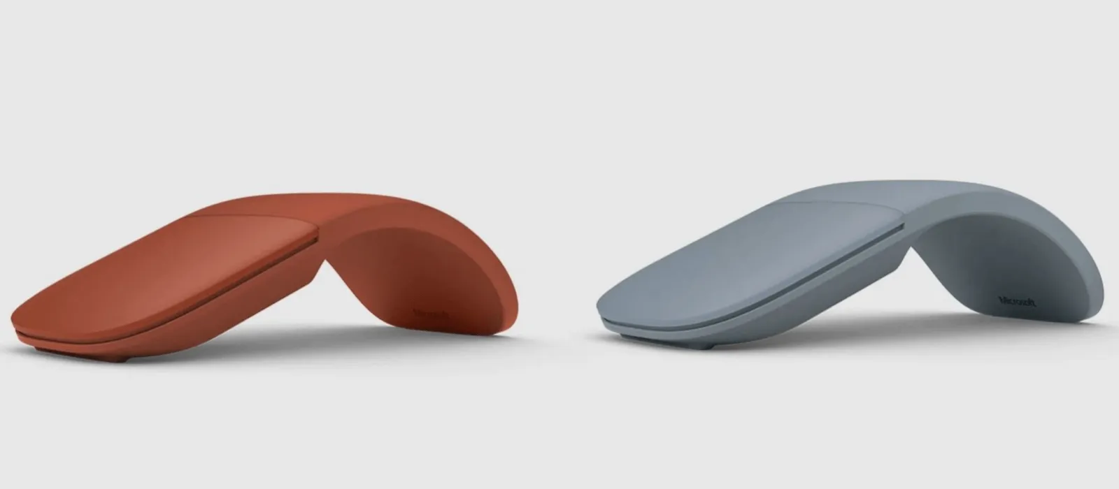 The Surface Arc Mouse in poppy red and ice blue