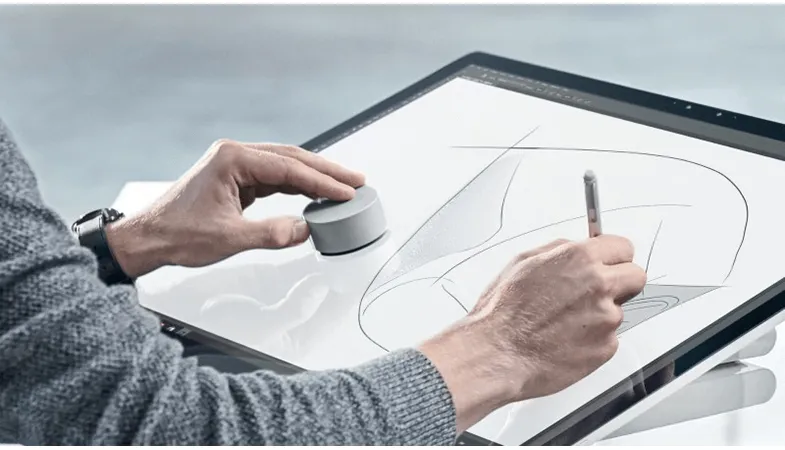 Set creativity free with the Surface Dial The Surface Dial is used with a Surface Pen on the Surface Studio 2 for creative work