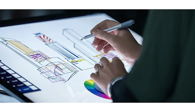 The Surface Dial can be used within many different applications The Surface Dial is placed on the Surface Studio 2 and is used by one person for colour selection while drawing with the Surface Pen