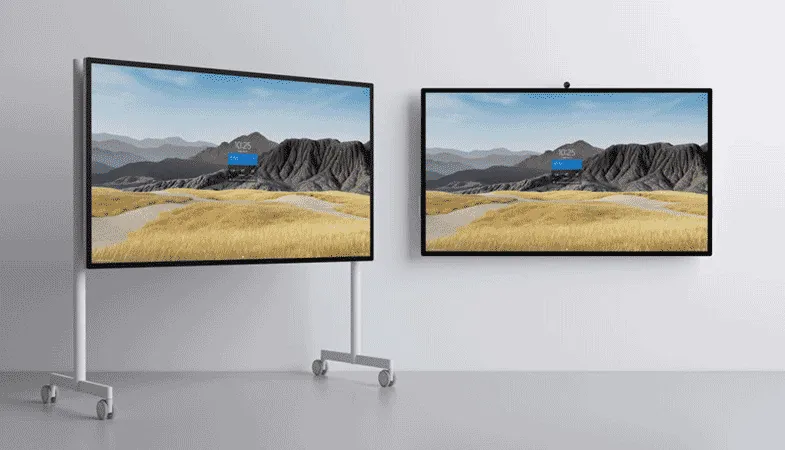 The Surface Hub 2S as an 85-inch version Two Surface Hub 2S as 85-inch models, one stands on a rolling stand, the other is hanging on the wall