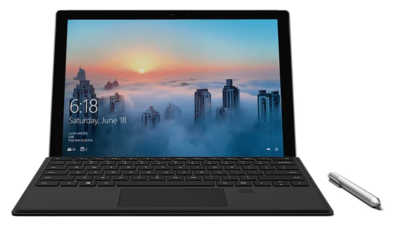 The Surface Pro including the Type Cover with Fingerprint ID in laptop mode, a Surface Pen is placed on the right side 
