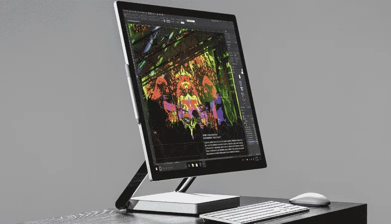 Create new workflows with the Surface Studio 2+ A lateral perspective on the Surface Studio 2+ with a Surface Mouse and Surface Keyboard in front of it