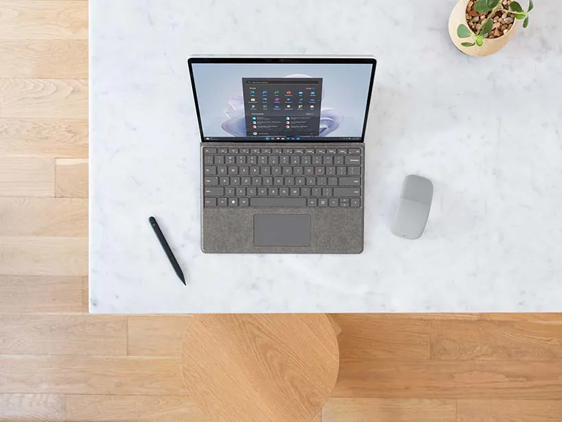 The Surface Pro 9 offers everyday flexibility with various accessories A Surface Pro 9 sits on a table with the Surface Signature Keyboard and Surface Slim Pen 2
