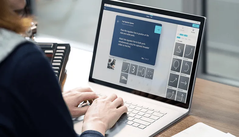 Always work with the latest versions in Microsoft 365 thanks to monthly updates A person editing a presentation at the Surface Book